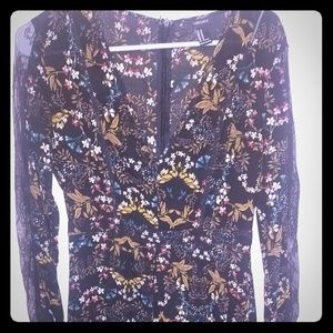 Dress with open slit in front has shorts